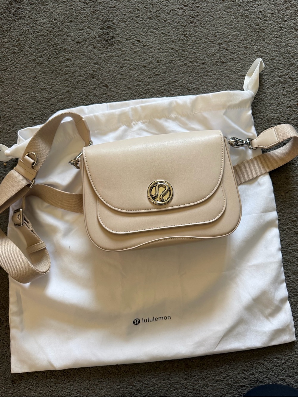 lululemon athletica Cream Crossbody Bag with Gold Logo